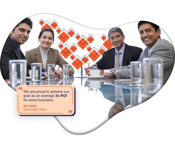 A group of people sitting together at a table, participating in a meeting.